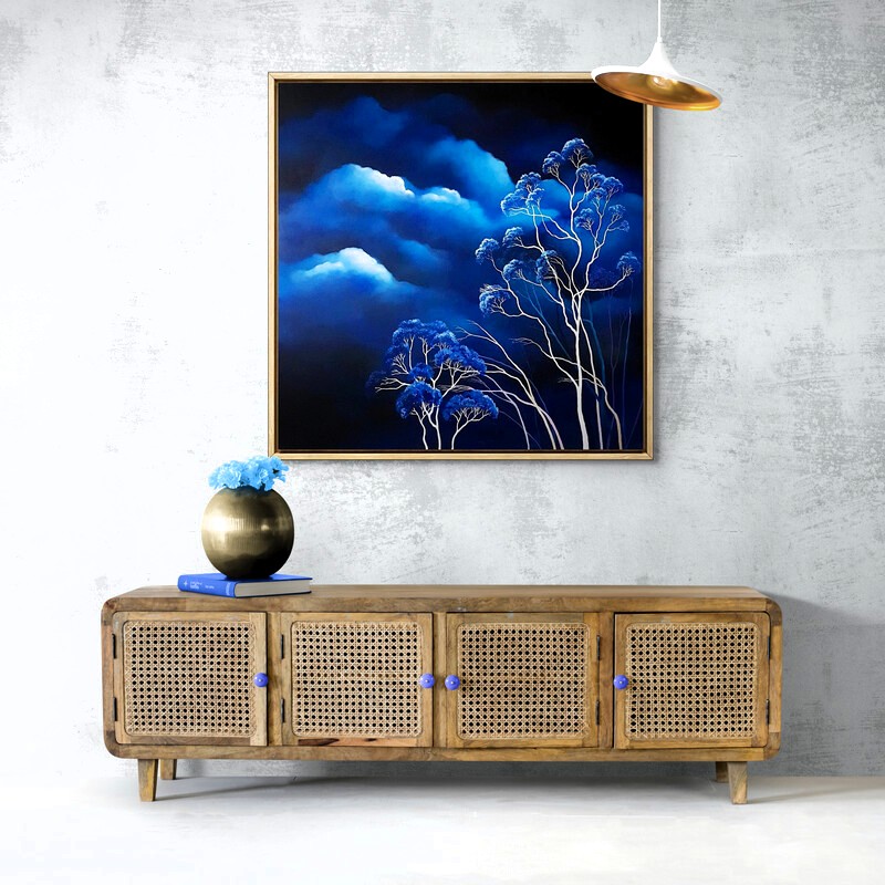 Large atmospheric landscape painting with white eucalyptus trees and dramatic blue storm clouds. Original Australian cloudscape artwork by Lucinda Leveille featuring weather, mood and contemporary landscape painting.