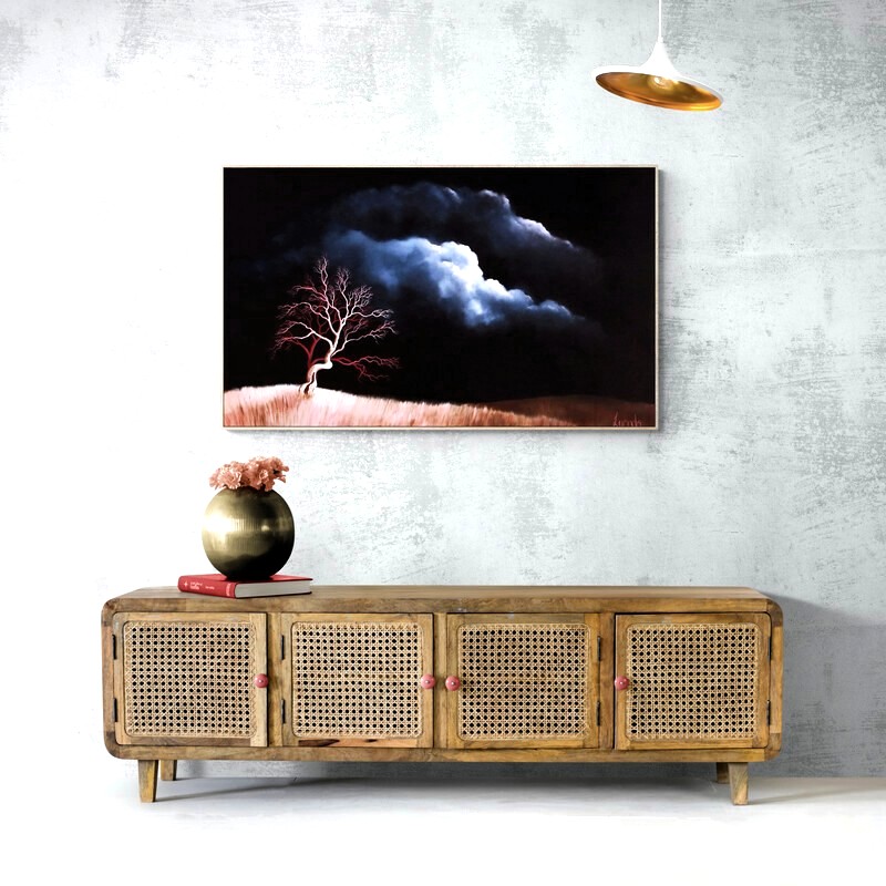 Original Australian landscape painting featuring a solitary weathered tree beneath dramatic indigo storm clouds. Atmospheric oil painting by Lucinda Leveille exploring resilience, quiet strength and the beauty of changing weather.