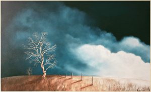 A solitary bare tree stands on a windswept hill beside a fading line of fence posts. Dark blue storm clouds gather above, with a pale bank of light pushing through on the right, casting long shadows across dry grass. An original Australian contemporary landscape from Lucinda Leveille, Affordable Art Fair Brisbane 2026