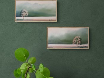 Small atmospheric Australian landscape painting by Lucinda Leveille, flowering tree and muted green sky, framed in oak