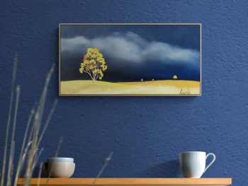 Atmospheric Australian landscape painting by Lucinda Leveille, gold tree standing on gold grasses, Affordable Art Fair Brisbane 2026 - insitu