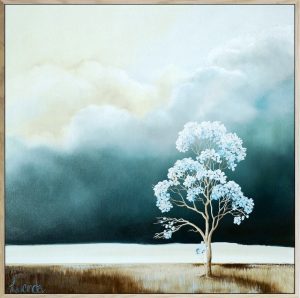 Original Australian landscape oil painting by Lucinda Leveille featuring a solitary tree with pale blue foliage beneath a deep teal sky, soft light breaking through clouds over a minimal horizon, framed in a natural oak floating frame.