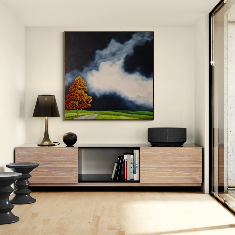 Amber Crown Above the Valley, original Australian landscape painting featuring luminous amber trees beneath dramatic cloud formations and an atmospheric sky.