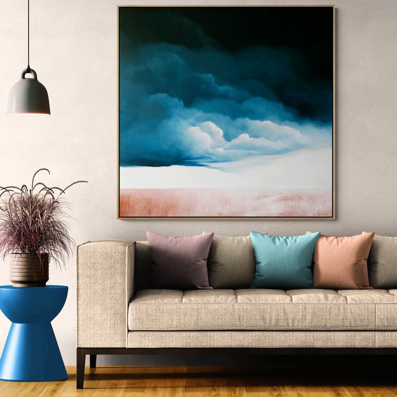 Before the Sky Breaks, original Australian landscape painting featuring luminous storm clouds above an open Australian landscape and atmospheric sky.