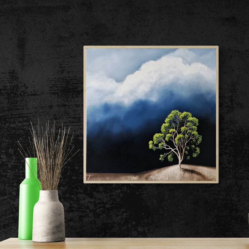 Original Australian landscape painting featuring a solitary green tree beneath dramatic storm clouds by Lucinda Leveille, 50 x 50 cm.