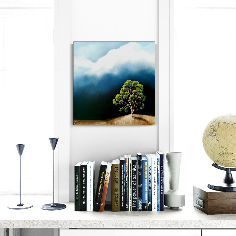 Atmospheric Australian landscape painting featuring a luminous green tree beneath dramatic storm clouds and approaching weather.
