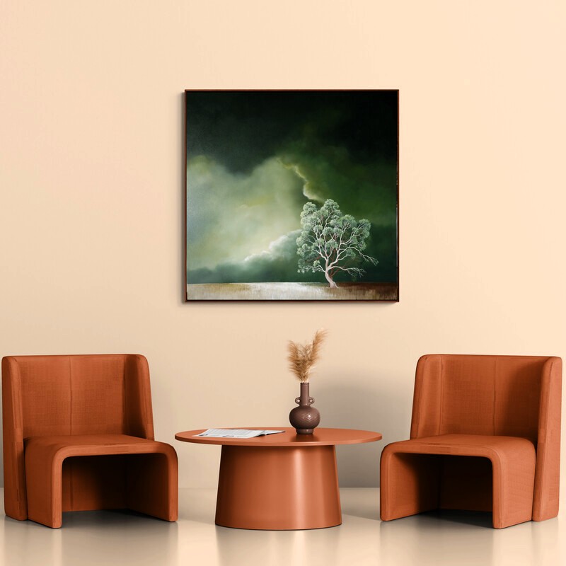 Original Australian landscape painting featuring a luminous gum tree beneath dramatic green storm clouds, with radiant light breaking through the clouds. Contemporary oil painting by Lucinda Leveille.